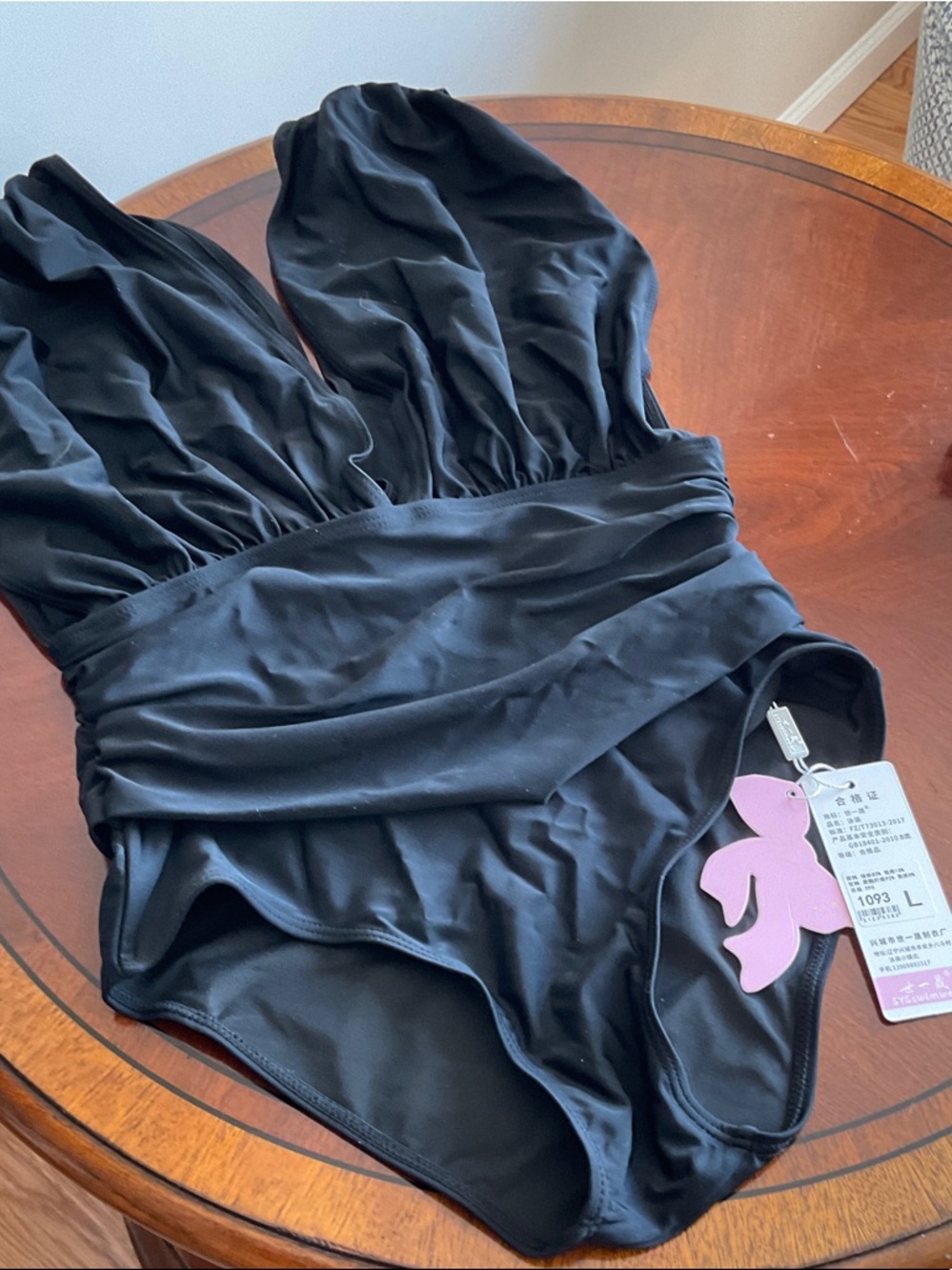 Classic Black One-Piece Swimsuit with Draped Waist